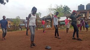 Beatrice leading a dance session